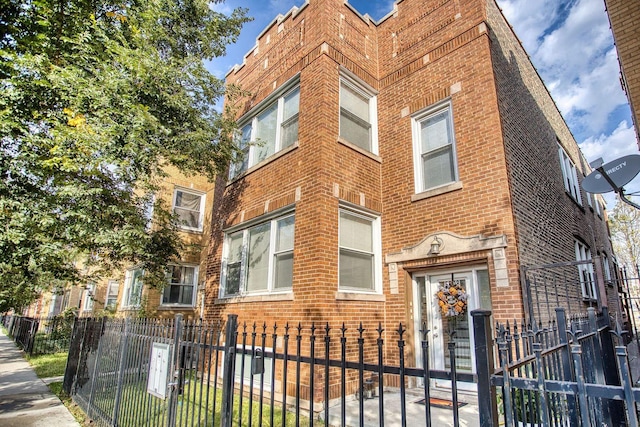 view of property featuring a fenced front yard