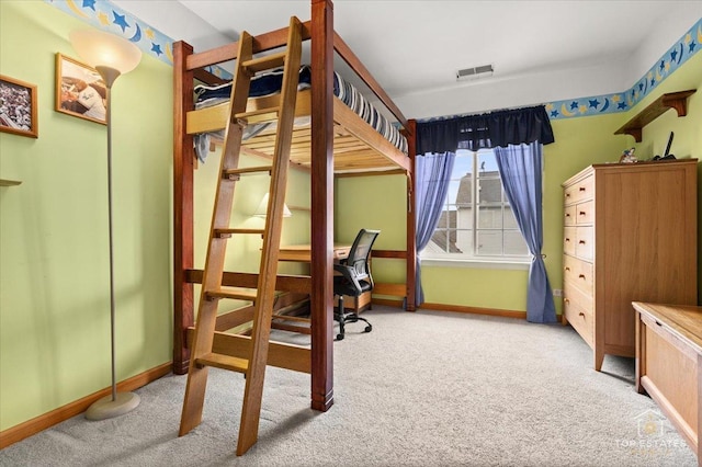 bedroom with visible vents, baseboards, and carpet