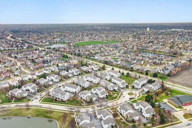 aerial view featuring a water view and a residential view