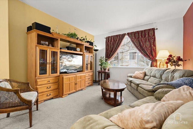 living area with light carpet