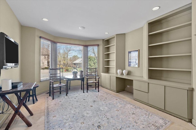 office with baseboards, recessed lighting, and built in shelves
