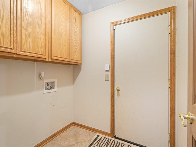 2072 Charnwood Ct, Machesney Park, IL 61115 - laundry room featuring light tile patterned flooring, baseboards, hookup for a washing machine, and cabinet space