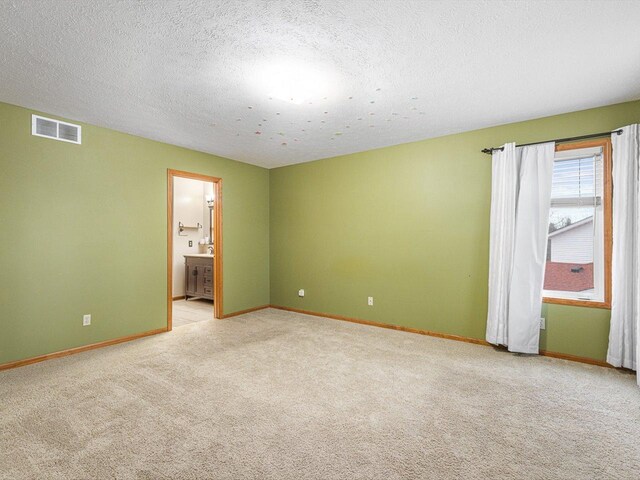 2072 Charnwood Ct, Machesney Park, IL 61115 - empty room with light carpet, baseboards, and visible vents