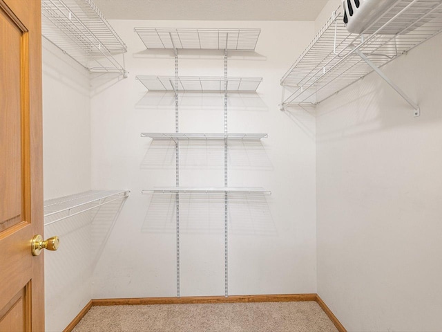 2072 Charnwood Ct, Machesney Park, IL 61115 - spacious closet featuring light colored carpet