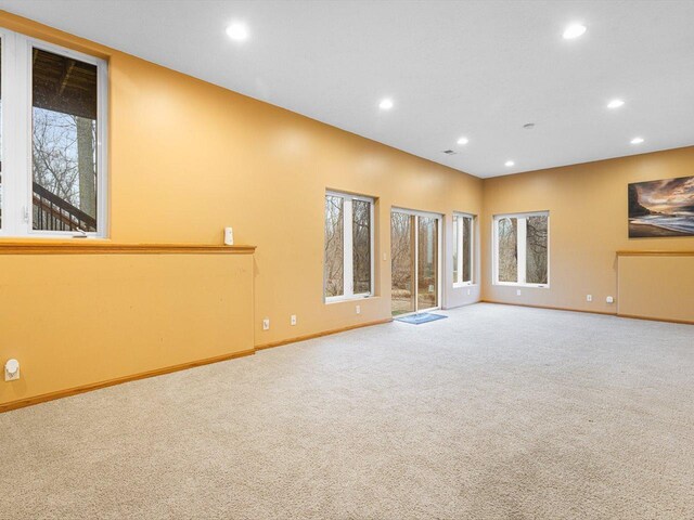 2072 Charnwood Ct, Machesney Park, IL 61115 - carpeted spare room with baseboards and recessed lighting