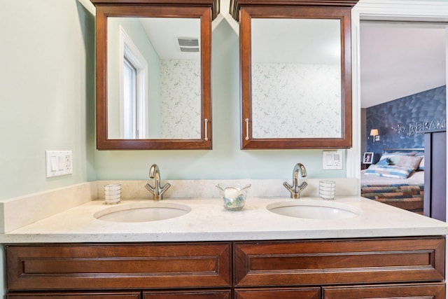34550 N Stanley Rd, Ingleside, IL 60041 - bathroom with double vanity, a sink, and visible vents