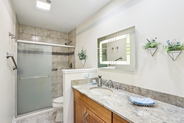 34550 N Stanley Rd, Ingleside, IL 60041 - full bath featuring a shower stall, tile patterned flooring, vanity, and toilet