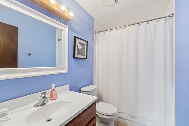 full bathroom with toilet, vanity, and a shower with curtain
