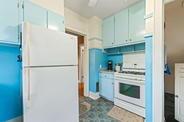kitchen with ceiling fan, light countertops, white appliances, and blue cabinetry