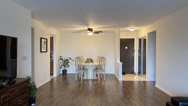 2050 Valencia Dr Unit 405, Northbrook, IL 60062 - dining area with a ceiling fan, wood finished floors, and baseboards