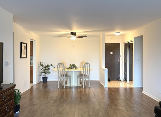 2050 Valencia Dr Unit 405, Northbrook, IL 60062 - dining area with ceiling fan, wood finished floors, and baseboards