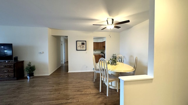2050 Valencia Dr Unit 405, Northbrook, IL 60062 - dining room with a ceiling fan, dark wood finished floors, and baseboards