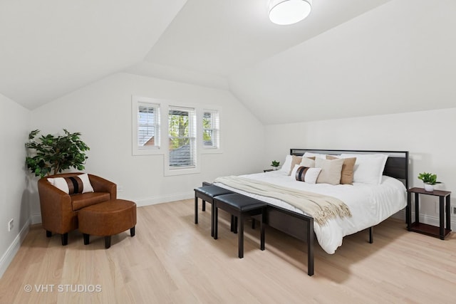 7440 S Oglesby Ave, Chicago, IL 60649 - bedroom featuring light wood-type flooring, baseboards, and vaulted ceiling
