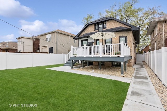 7440 S Oglesby Ave, Chicago, IL 60649 - rear view of house with a wooden deck and brick siding