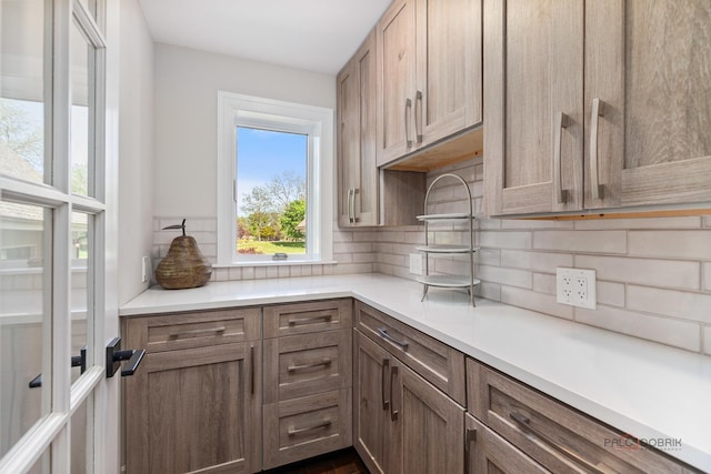 6517 Saddle Ridge Ct, Long Grove, IL 60047 - kitchen featuring tasteful backsplash and light countertops