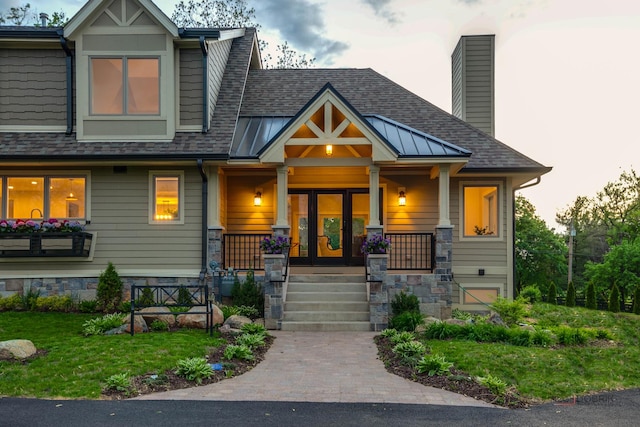 6517 Saddle Ridge Ct, Long Grove, IL 60047 - craftsman inspired home with covered porch, a chimney, and a shingled roof