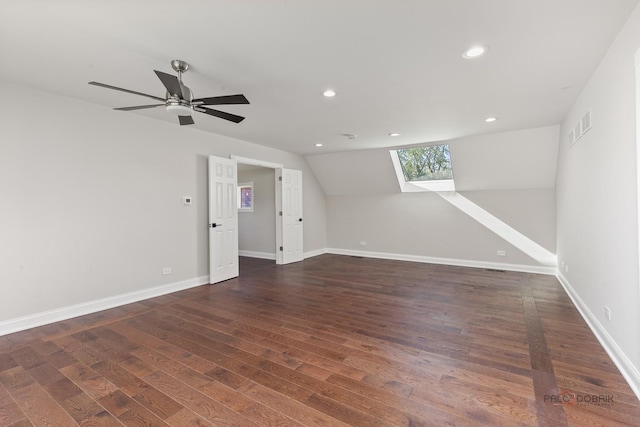 6517 Saddle Ridge Ct, Long Grove, IL 60047 - spare room featuring a skylight, wood finished floors, recessed lighting, baseboards, and a ceiling fan