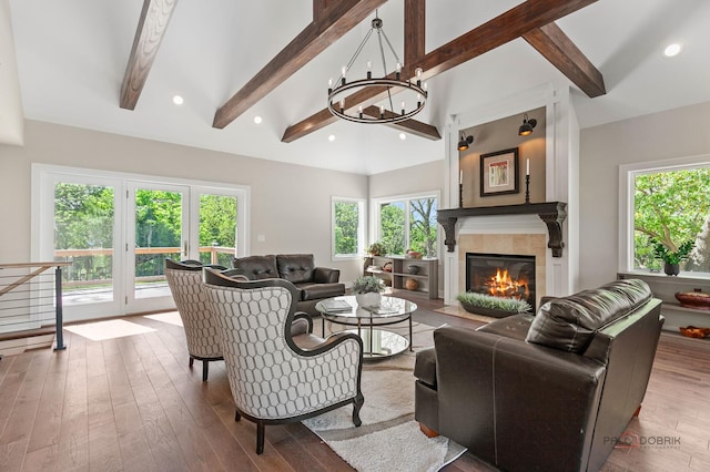 6517 Saddle Ridge Ct, Long Grove, IL 60047 - living area with hardwood / wood-style floors, a chandelier, a tile fireplace, and recessed lighting