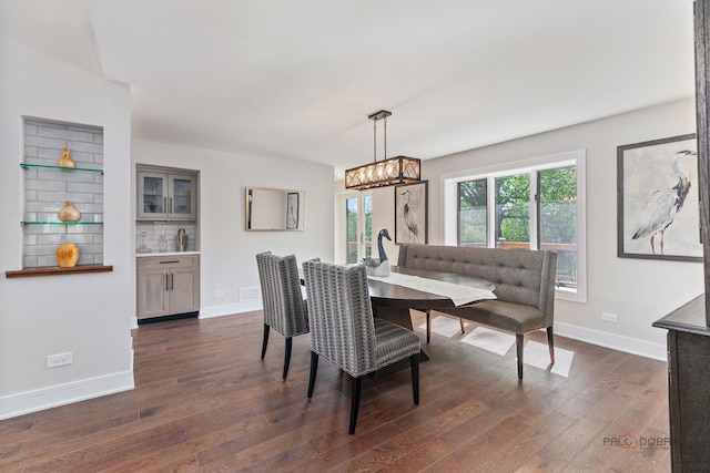 6517 Saddle Ridge Ct, Long Grove, IL 60047 - dining room with dark wood-style flooring, a chandelier, and baseboards