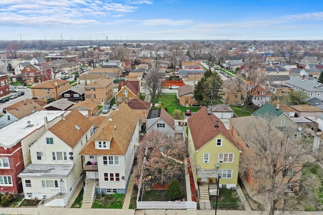 birds eye view of property with a residential view