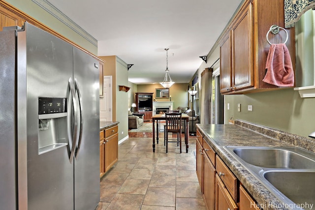 437 Deer Run Rd, Lakemoor, IL 60051 - kitchen with stainless steel fridge with ice dispenser, a sink, dark countertops, brown cabinets, and open floor plan