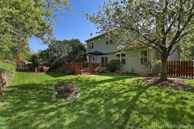 437 Deer Run Rd, Lakemoor, IL 60051 - view of yard with an outdoor fire pit and a deck