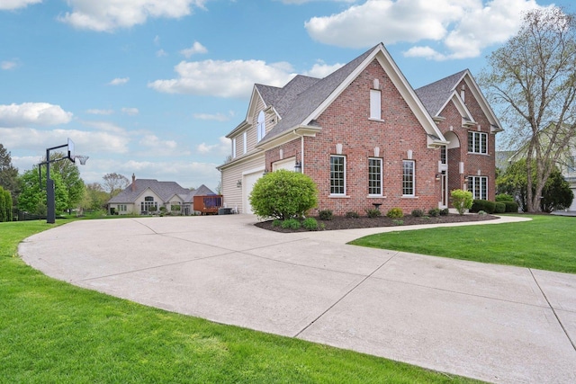 view of side of home with brick siding, concrete driveway, a yard, and an attached garage