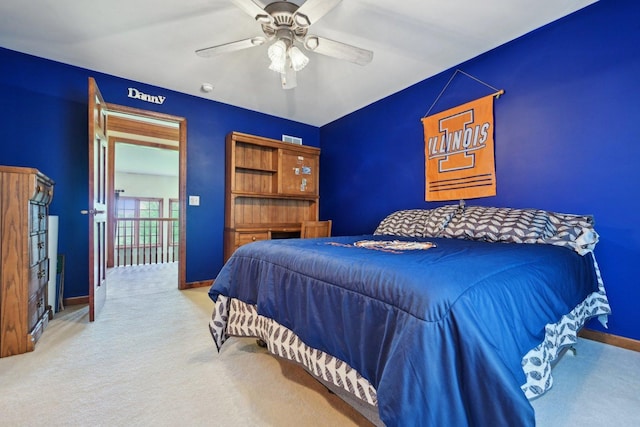 bedroom featuring carpet floors, baseboards, and a ceiling fan