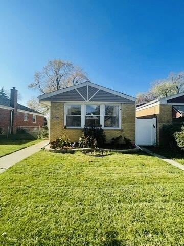 11362 S Laflin St, Chicago, IL 60643 - view of front of home featuring a front lawn and brick siding