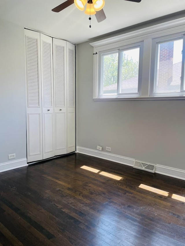 11362 S Laflin St, Chicago, IL 60643 - unfurnished bedroom featuring baseboards, dark wood-style floors, and a closet