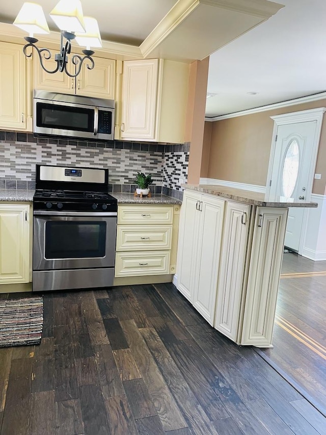 11362 S Laflin St, Chicago, IL 60643 - kitchen with stainless steel appliances, cream cabinets, ornamental molding, dark wood finished floors, and light stone countertops