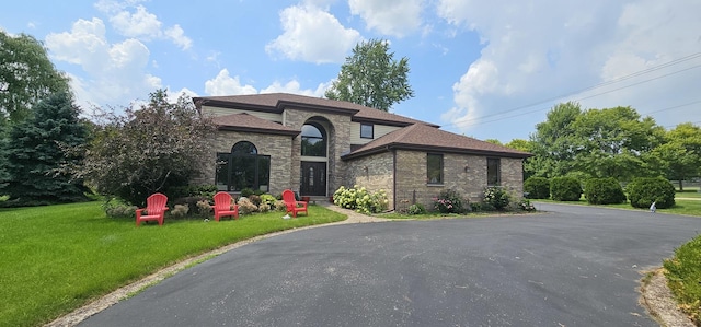 2 Rutgers Ct, Hawthorn Woods, IL 60047 - view of front of home featuring a front yard, brick siding, and roof with shingles
