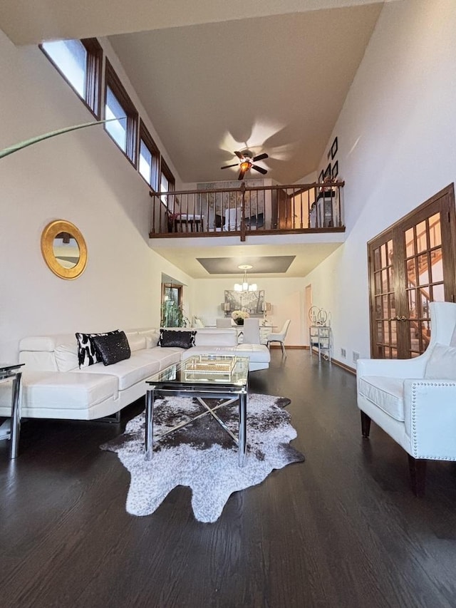 2 Rutgers Ct, Hawthorn Woods, IL 60047 - living room with a towering ceiling, wood finished floors, ceiling fan, baseboards, and a chandelier