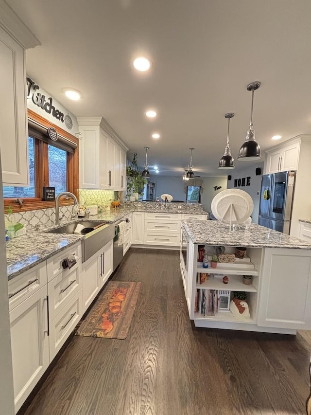 2 Rutgers Ct, Hawthorn Woods, IL 60047 - kitchen featuring appliances with stainless steel finishes, dark wood finished floors, open shelves, white cabinetry, and light stone countertops