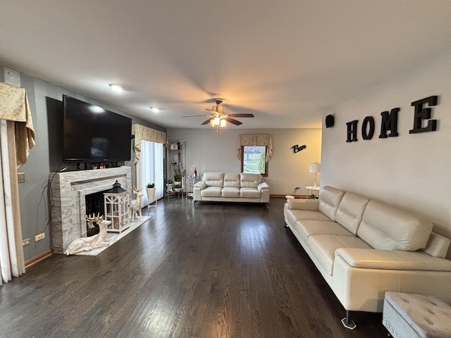 2 Rutgers Ct, Hawthorn Woods, IL 60047 - living room featuring dark wood-type flooring, ceiling fan, a fireplace, and baseboards