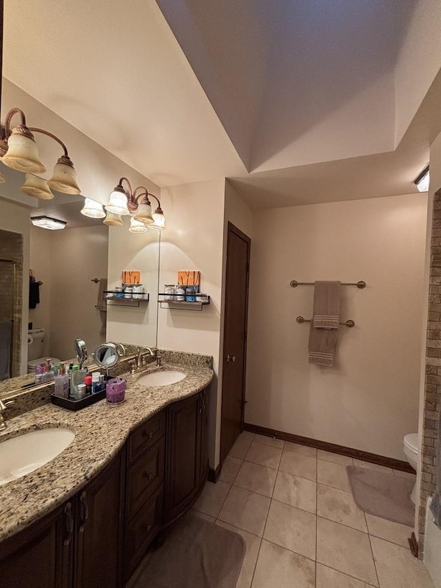 2 Rutgers Ct, Hawthorn Woods, IL 60047 - bathroom featuring toilet, double vanity, tile patterned floors, and baseboards