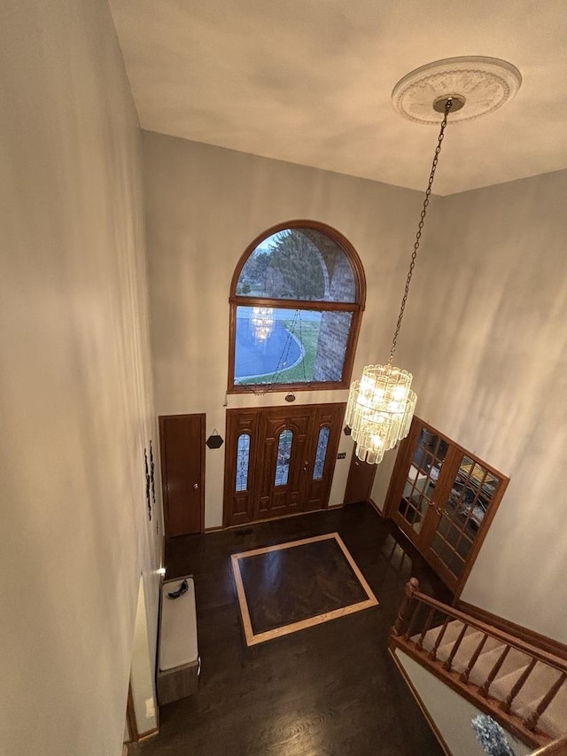 2 Rutgers Ct, Hawthorn Woods, IL 60047 - foyer featuring a chandelier, wood finished floors, and a high ceiling