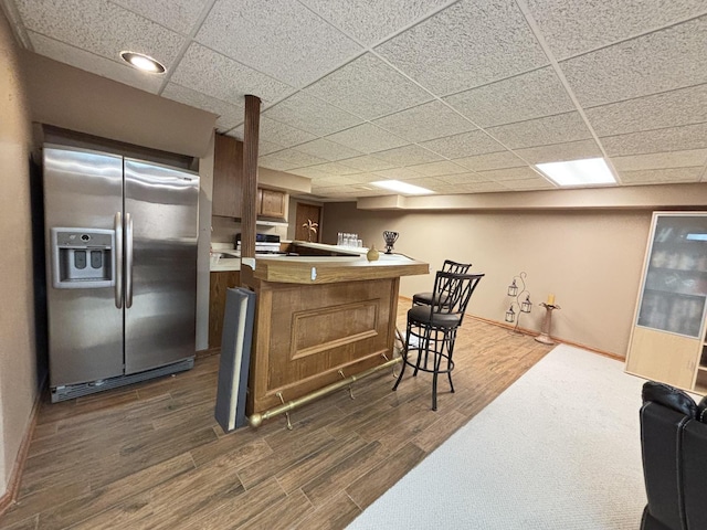 2 Rutgers Ct, Hawthorn Woods, IL 60047 - indoor bar with stainless steel fridge, dark wood finished floors, a paneled ceiling, and baseboards