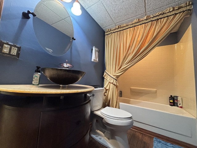 2 Rutgers Ct, Hawthorn Woods, IL 60047 - bathroom with toilet, vanity, wood finished floors, shower / tub combo, and a paneled ceiling