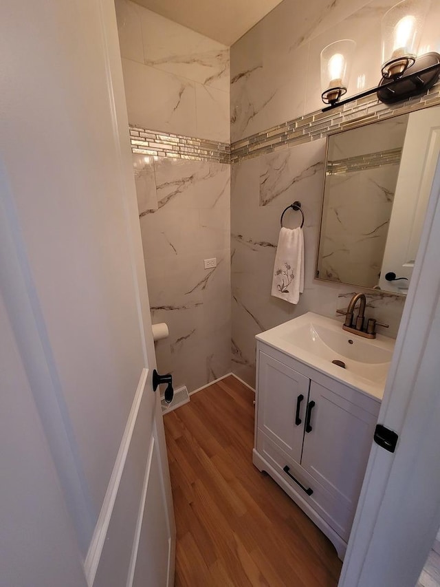 8416 Mccormick Blvd, Skokie, IL 60076 - bathroom with vanity and wood finished floors