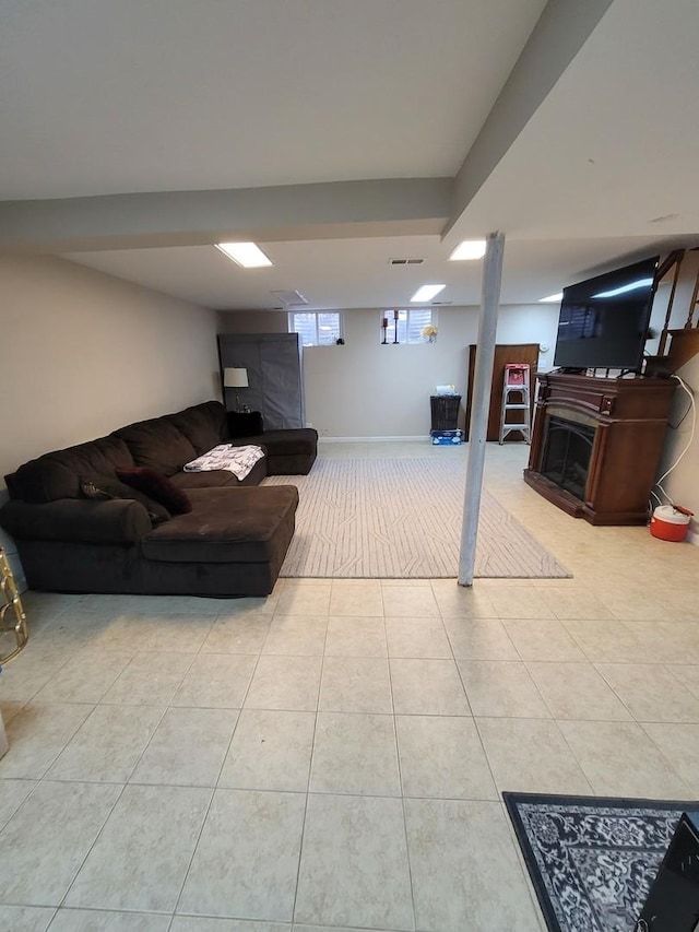 8416 Mccormick Blvd, Skokie, IL 60076 - tiled living area with visible vents and a fireplace