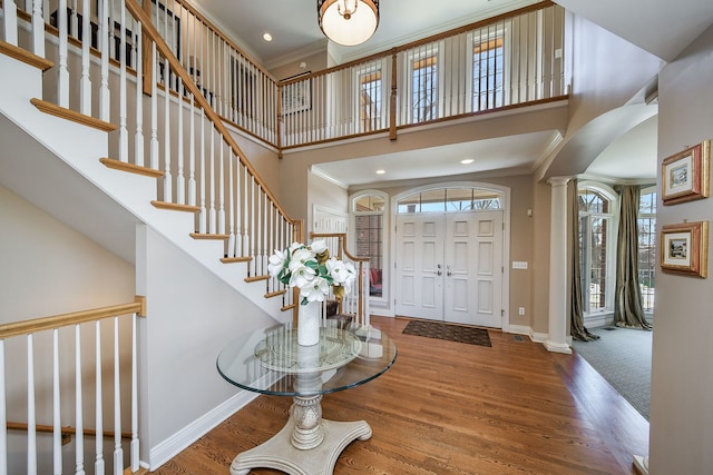 1303 Bonnema Ave, Naperville, IL 60565 - foyer entrance with ornamental molding, a wealth of natural light, and wood finished floors