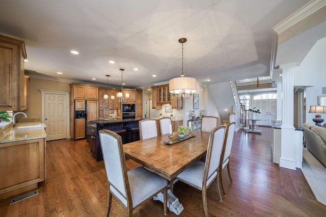 1303 Bonnema Ave, Naperville, IL 60565 - dining space with dark wood-type flooring, ornate columns, visible vents, recessed lighting, and crown molding