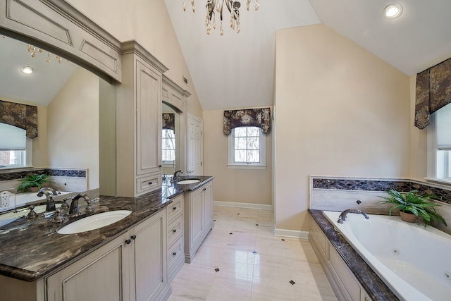 1303 Bonnema Ave, Naperville, IL 60565 - bathroom with lofted ceiling, recessed lighting, baseboards, vanity, and a tub with jets