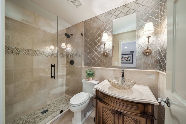 1303 Bonnema Ave, Naperville, IL 60565 - bathroom with tile walls, toilet, vanity, visible vents, and a shower stall