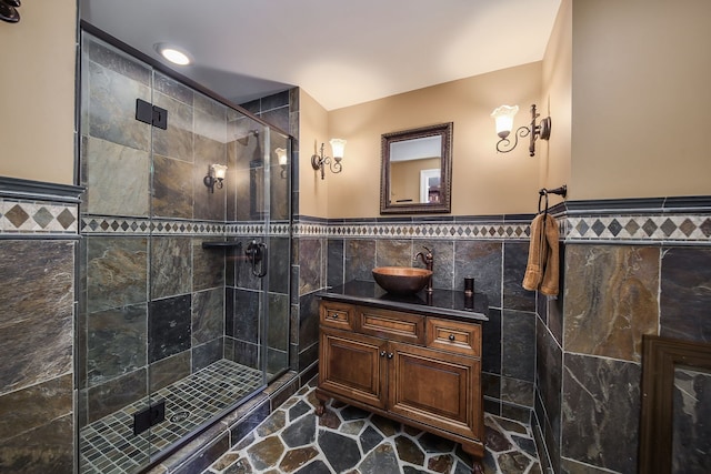 1303 Bonnema Ave, Naperville, IL 60565 - full bathroom featuring tile walls, wainscoting, and a shower stall