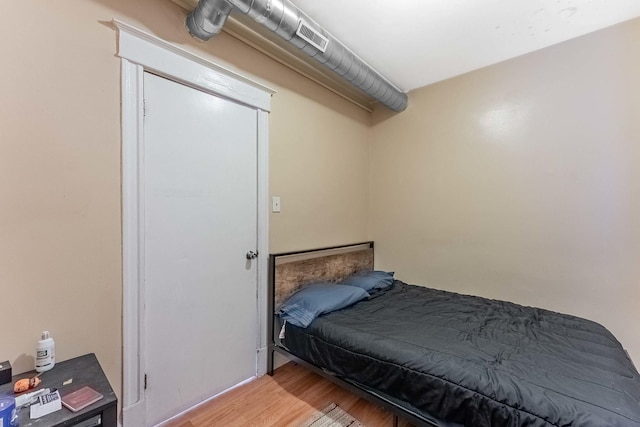 4026 N Kimball Ave, Chicago, IL 60618 - bedroom with light wood-style floors and visible vents