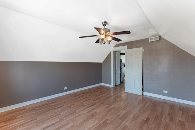 4026 N Kimball Ave, Chicago, IL 60618 - bonus room featuring baseboards, visible vents, ceiling fan, lofted ceiling, and wood finished floors