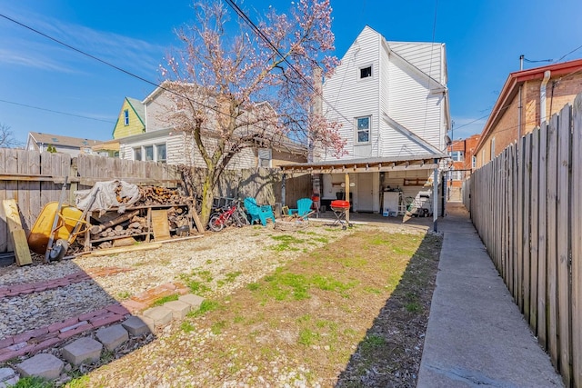 4026 N Kimball Ave, Chicago, IL 60618 - view of yard featuring a patio area and a fenced backyard
