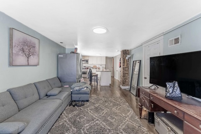 4026 N Kimball Ave, Chicago, IL 60618 - living area with visible vents and light wood-type flooring